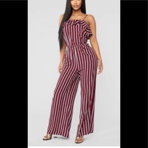 A burgundy and white jumper suits.